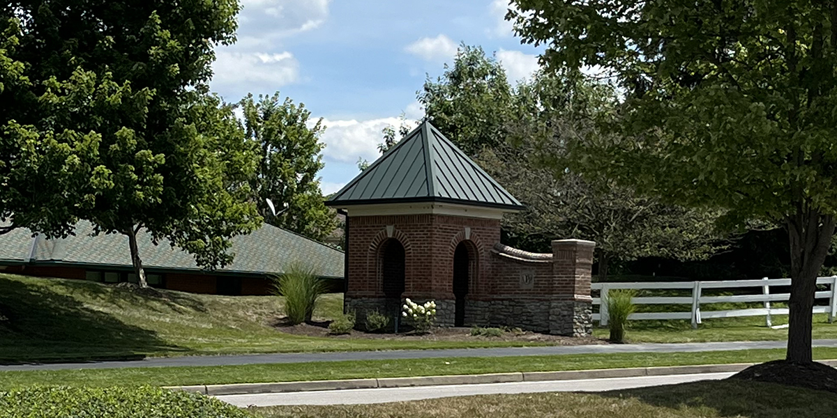 Monument on Wetherington near HWY 42 Entrance